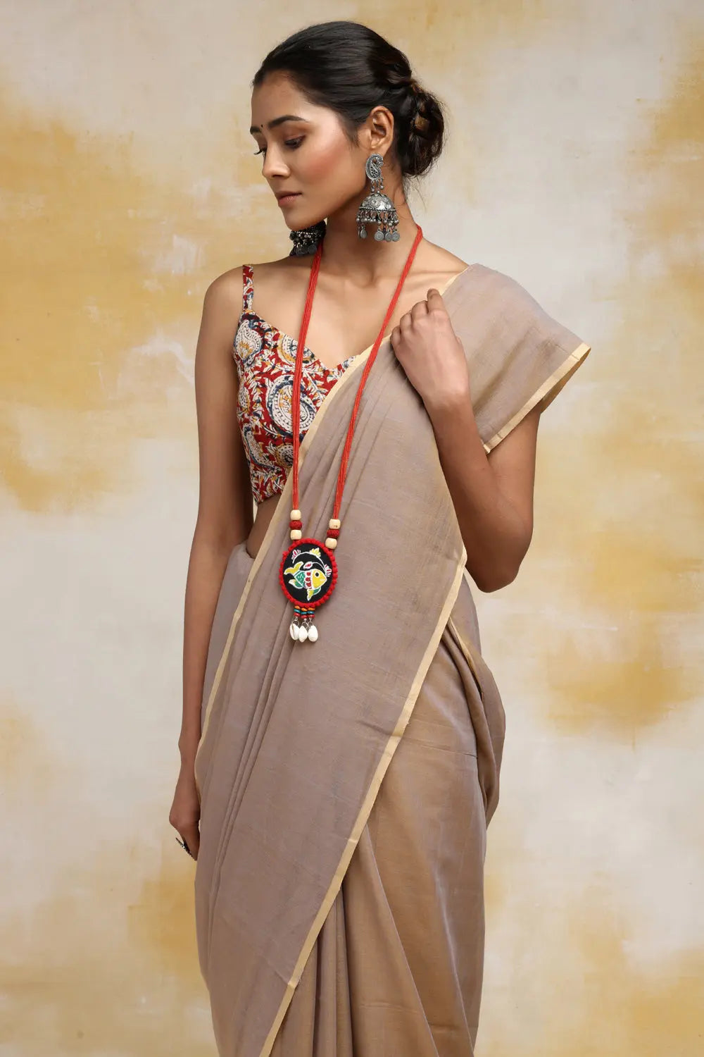 Handloom Clay Beige Mulmul Cotton Saree With Tassels