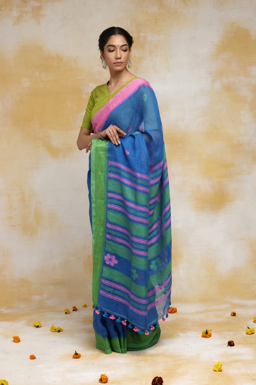 Handloom Blue Linen Saree With Pink & Green Floral Motifs And Tassels