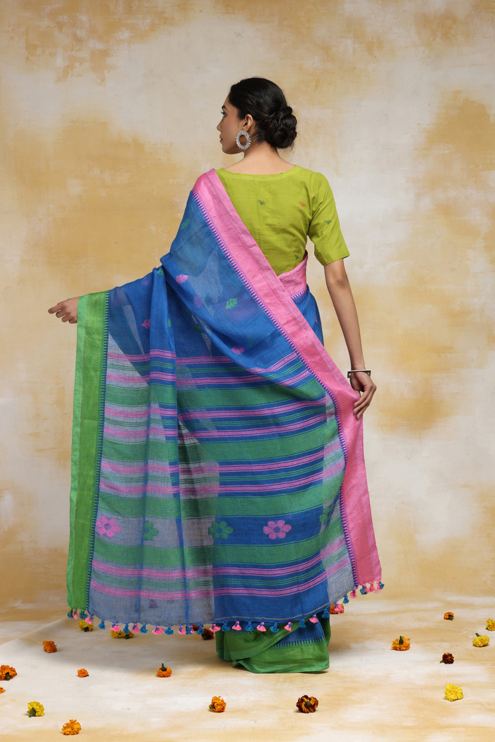 Handloom Blue Linen Saree With Pink & Green Floral Motifs And Tassels