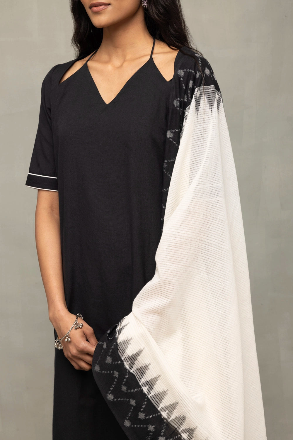 Close Up of Ikkat Weave Pattern on Dupatta with Black Handloom Kurta Set