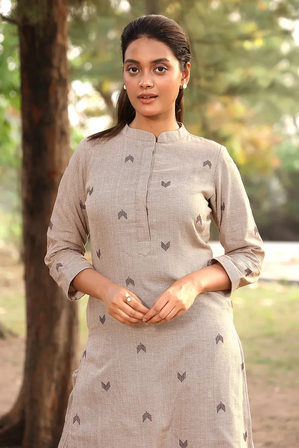 Close Up of Pure Cotton Fabric Texture on Beige Kurta Set