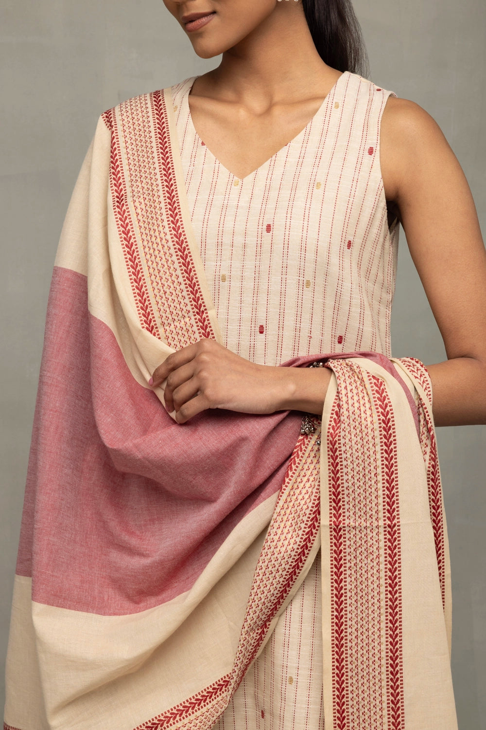 Close Up of Zari Weave on Cream and Pink South Cotton Kurta Set