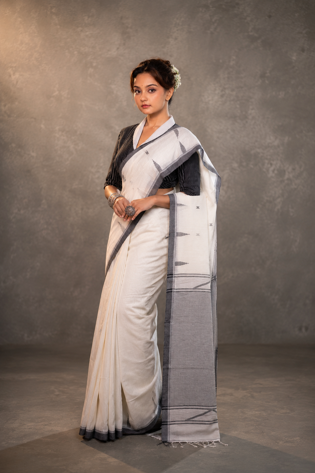 Ivory Whisper Jamdani saree draped elegantly