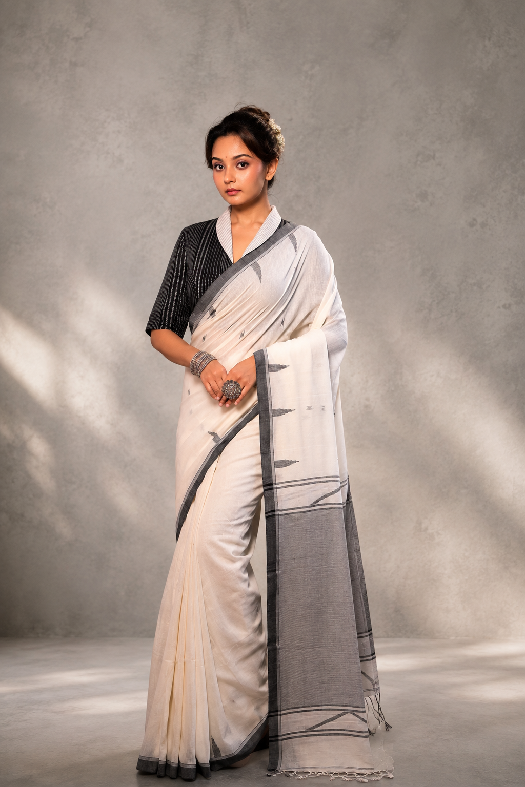Close-up of intricate weave detail on Ivory Jamdani saree
