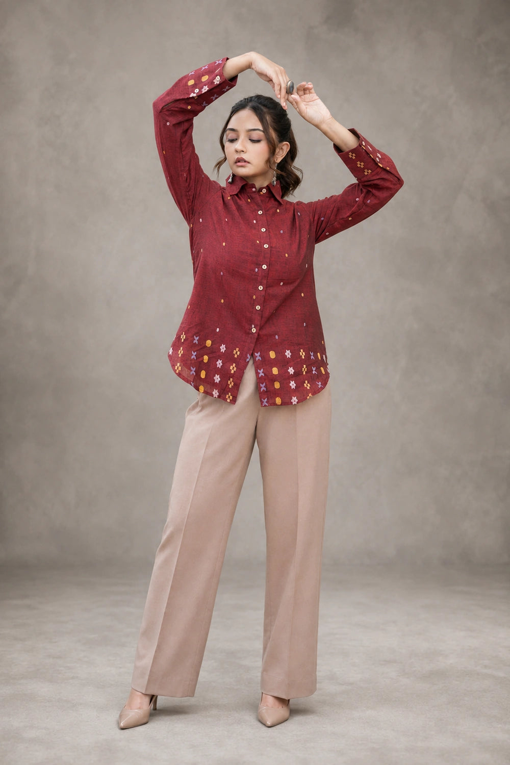 Handwoven Jamdani weave detail on maroon cotton shirt