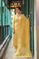 Soft Yellow Mul Chanderi Hand Knotted Bandhani Kurta Set With Dupatta